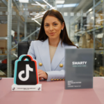 Emily Gallant, Co-Founder of eFones.com, poses with awards.